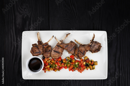Roasted lamb ribs with vege...