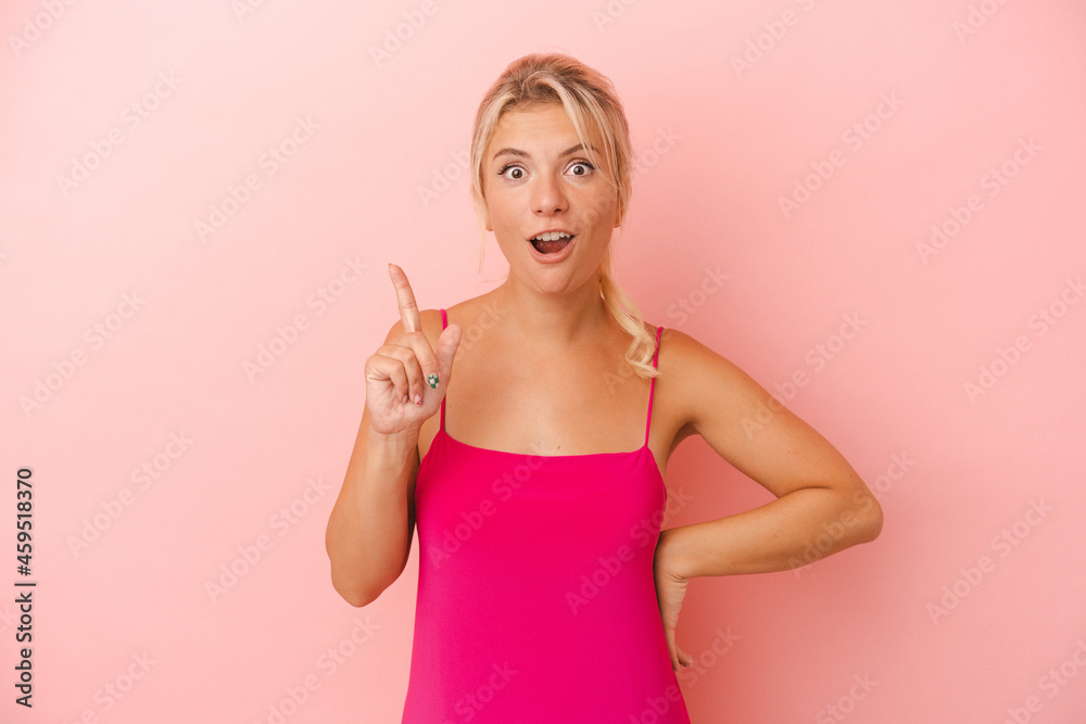 Young Russian woman isolated on pink background having an idea, inspiration concept. Young Russian woman isolated on pink background having an idea, inspiration concept.