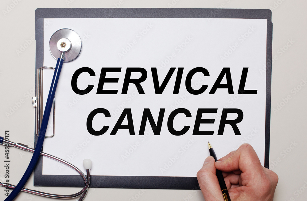 On a light background, a stethoscope and a sheet of paper, on which a man writes CERVICAL CANCER. Medical concept On a light background, a stethoscope and a sheet of paper, on which a man writes CERVICAL CANCER. Medical concept