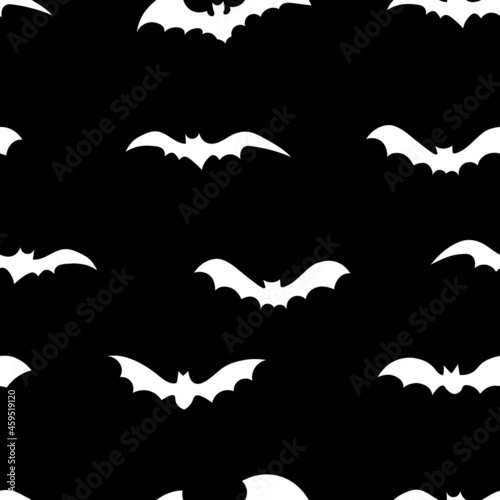 White silhouettes of bats seamless pattern  on black background.  Halloween design for baby clothes, bedding, textiles, print, wallpaper.