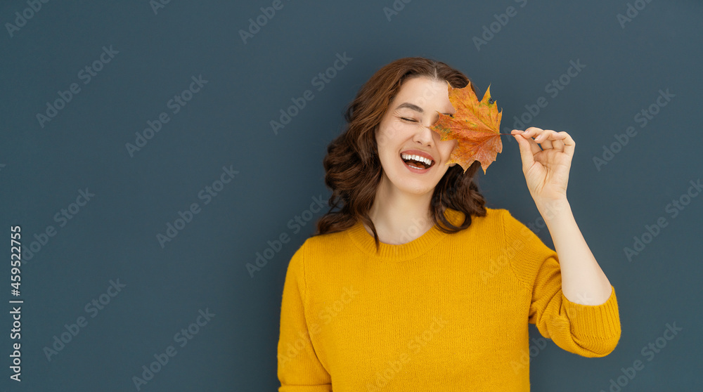 woman with yellow leaf