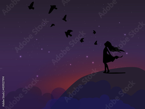 silhouette of a girl on a background of the starry sky.