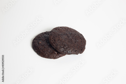 Chocolate chip cookies isolated on white background. Sweet dessert biscuits. Homemade pastry. Top close shot.