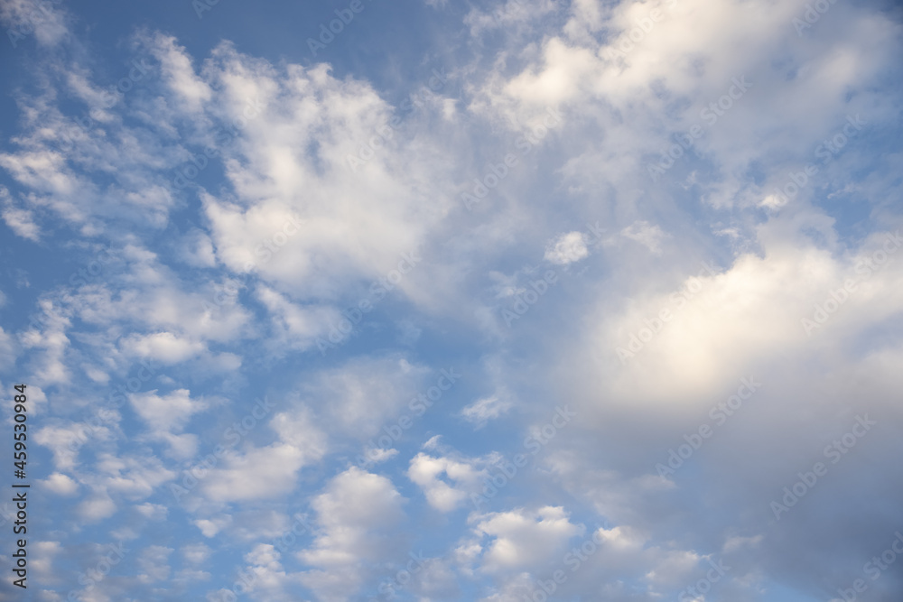 Obraz premium Amazing clouds hanging in the blue sky. Wonderful sunset and a better sunrise with beautiful clouds with a colorful sky.