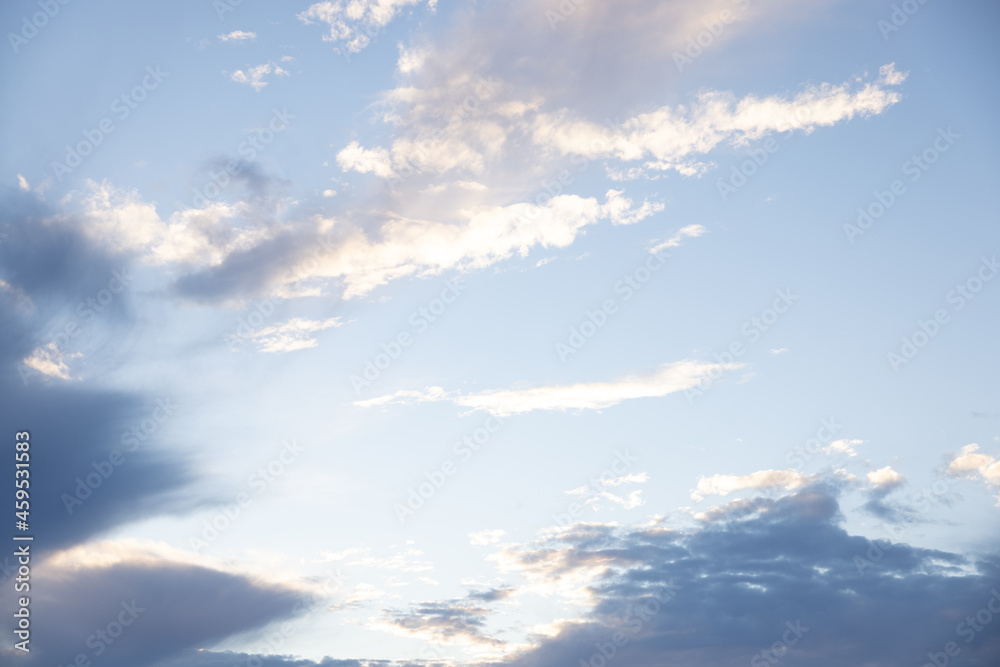 Obraz premium Amazing clouds hanging in the blue sky. Wonderful sunset and a better sunrise with beautiful clouds with a colorful sky.