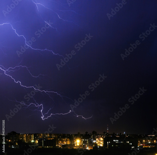 Lightning in the city at night