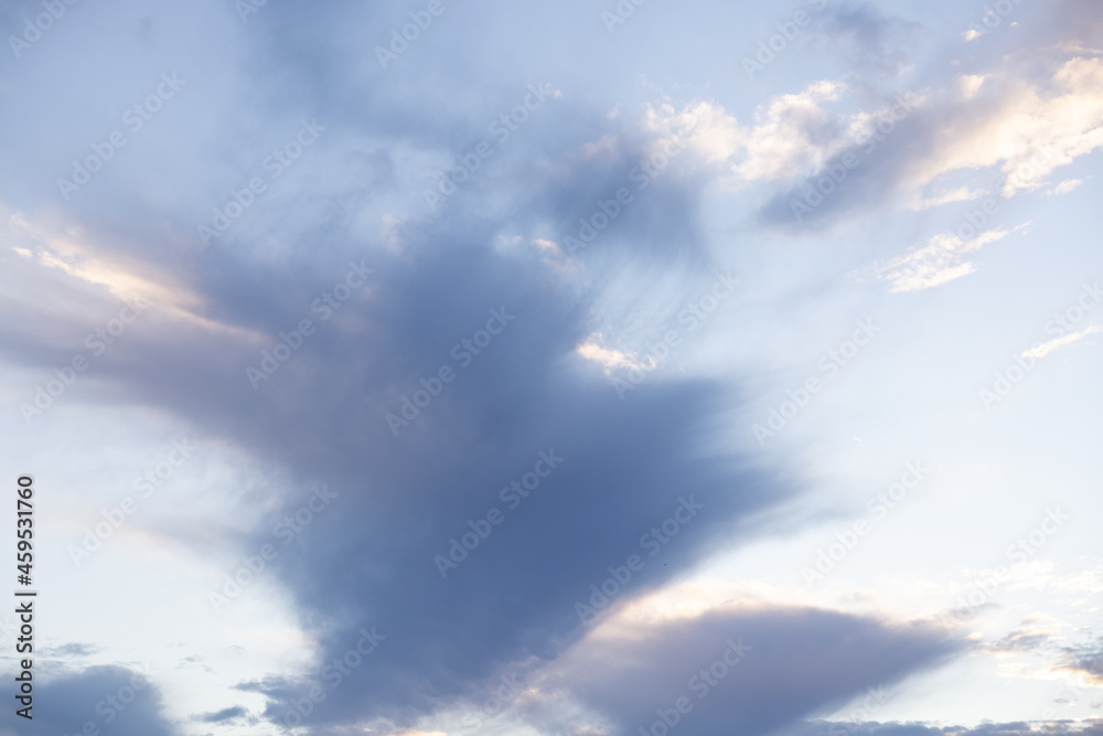 Fototapeta premium Amazing clouds hanging in the blue sky. Wonderful sunset and a better sunrise with beautiful clouds with a colorful sky.