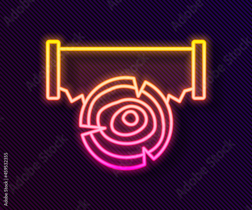 Glowing neon line Two-handed saw and log icon isolated on black background. Vector