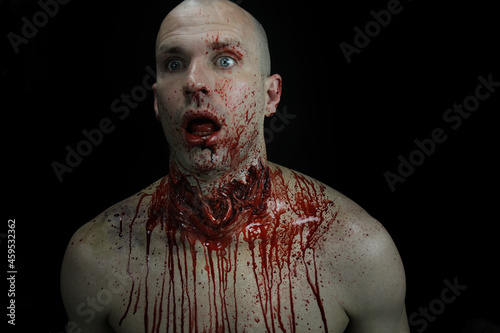 male with bleeding ripped out throat  #2 photo