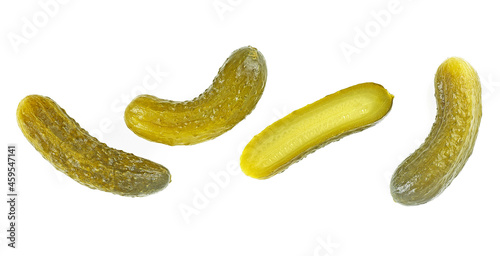 Delicious marinated pickled cucumbers isolated on a white background  top view. Canned cucumbers and slices. Gherkins.