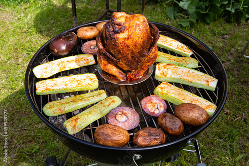 Chicken carcass baked on a kettle grill