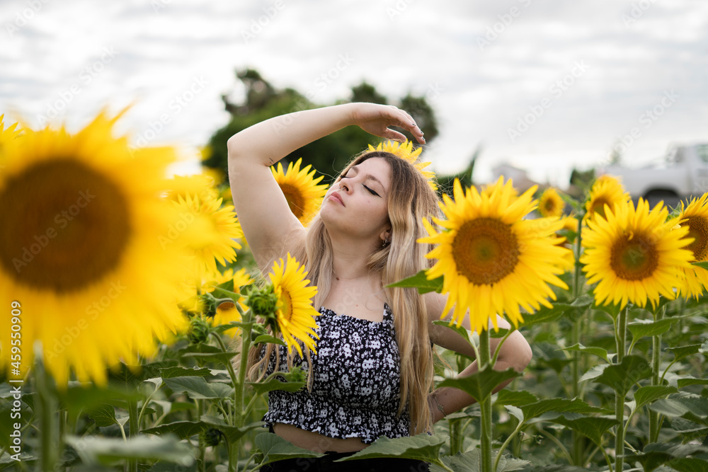 Blonde girl with sunflowers Blonde girl with sunflowers