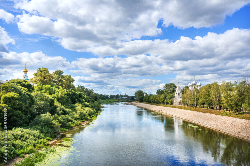 The Vologda River and the Church of St. John Chrysostom on a summer sunny day The Vologda River and the Church of St. John Chrysostom on a summer sunny day