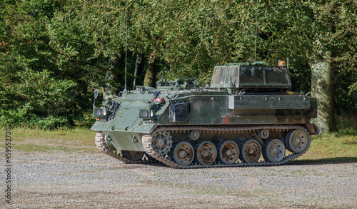 British army FV432 Bulldog armoured personnel carrier in action on a military exercise, Salisbury Plain Wiltshire UK
