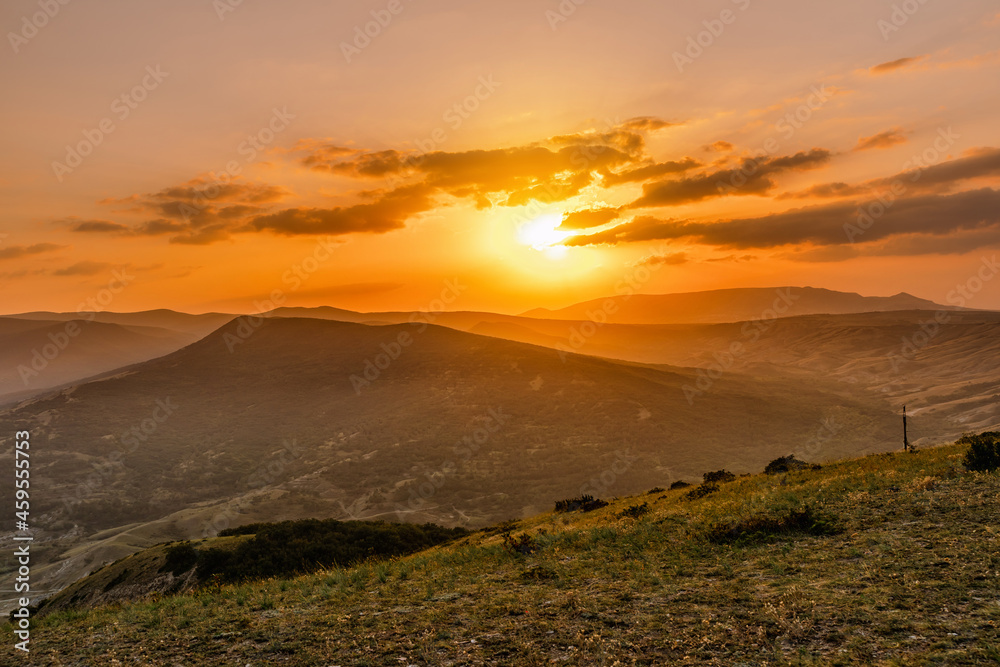 Scenic mountain landscape at sunset. Colorful travel background.