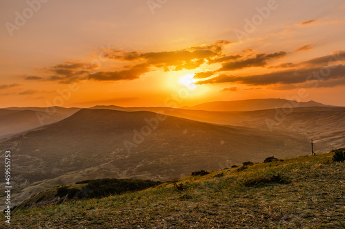 Scenic mountain landscape at sunset. Colorful travel background.