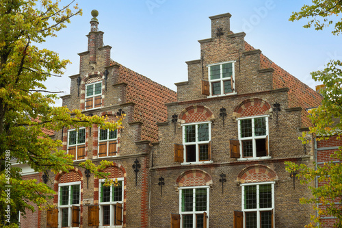 Facades of the canal houses in the old picturesque town of Oudewater, Netherlands. © Jan van der Wolf