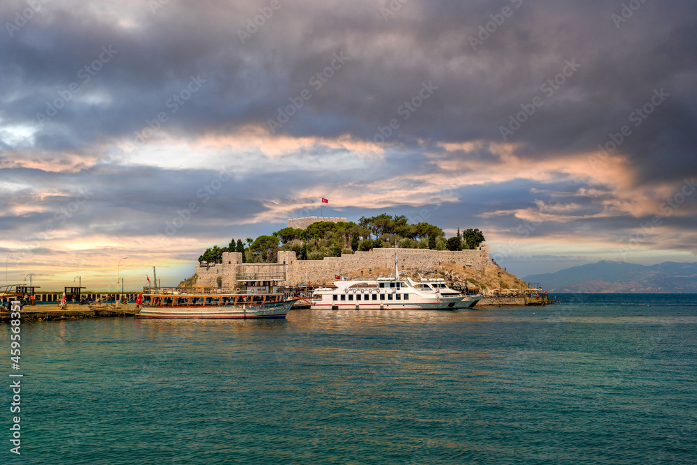 Fototapeta premium Kusadasi, Turkey - August 22, 2021: Pigeon Island Castle, (Guvercinada kalesi in Turkish) is a tourist attraction.