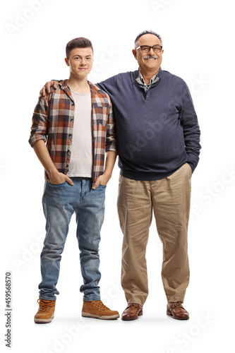 Full length portrait of a father embracing son