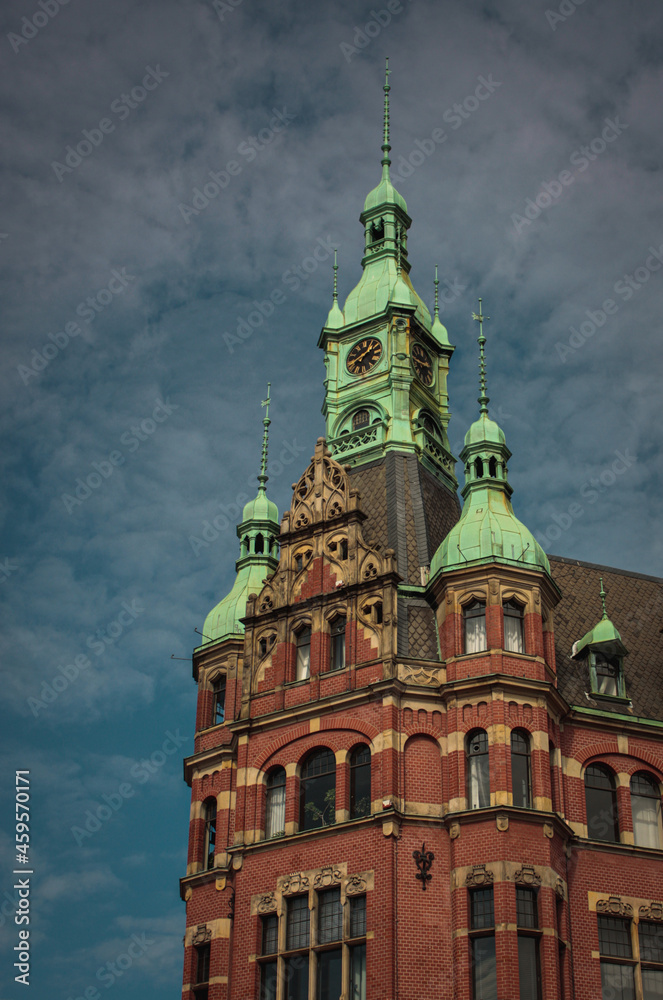 Typical red brick building with green roofs in Hamburg´s famous and historical Speicherstadt.