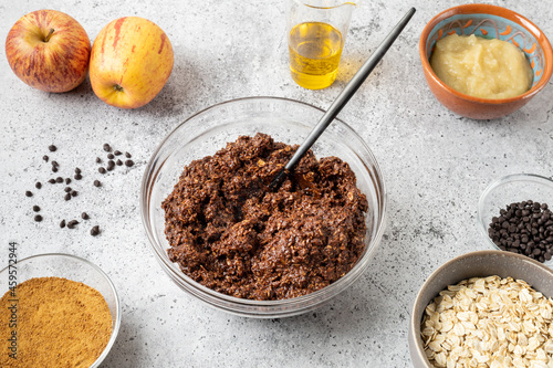 Vegan chocolate oatmeal cookie mix and ingredients. Homemade baking. Healthy dessert.