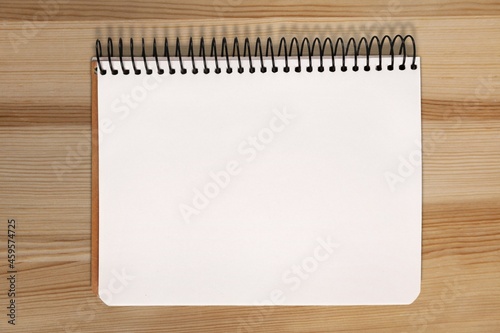 One page of the blank monthly calendar on the desk