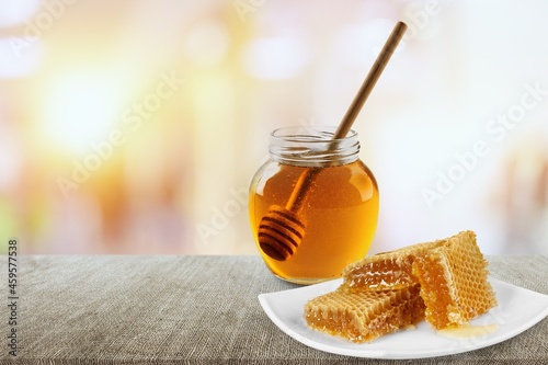 Honeycomb set. Wooden honey dippers. Package design elements