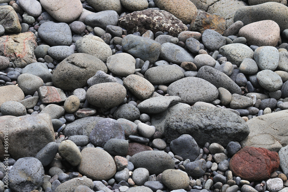 Stacked Beach stones and pebble texture for industrial background Stacked Beach stones and pebble texture for industrial background