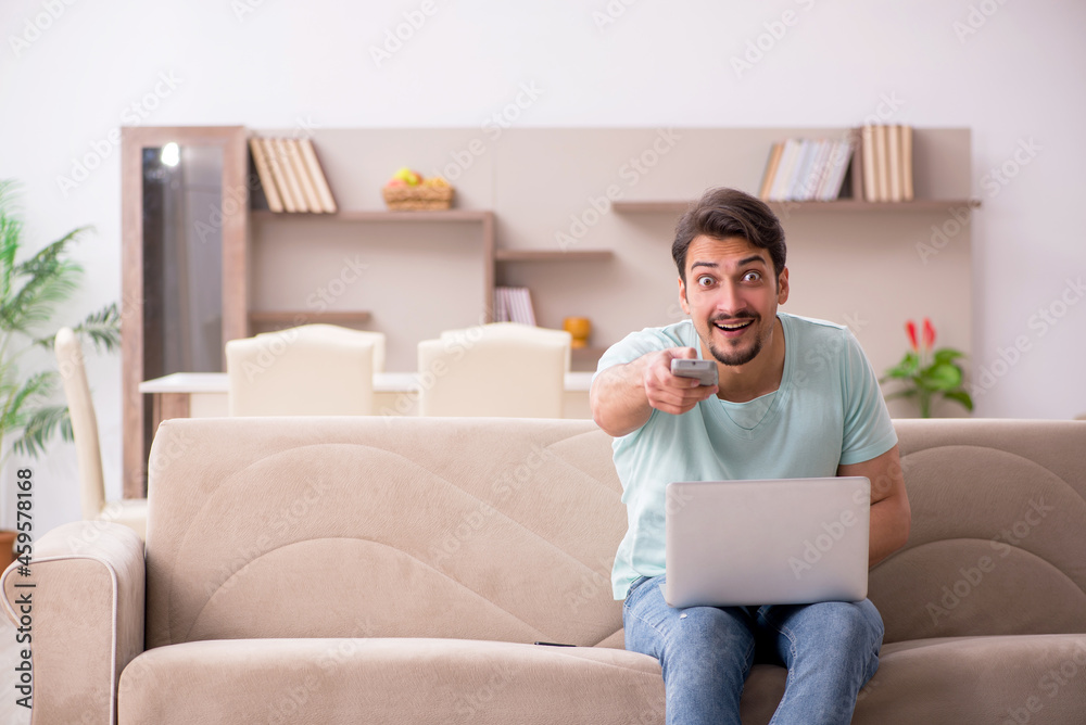 Young male freelancer working from home Young male freelancer working from home