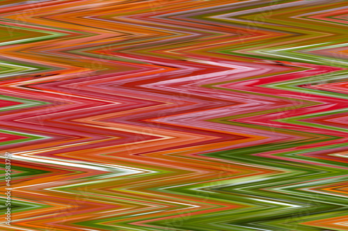 Abstract beautiful background with bright geometric lines of green, pink, red, orange, yellow, shades