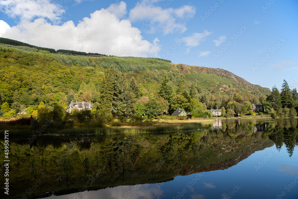 Reflections on Loch Ard in Scotland, UK
