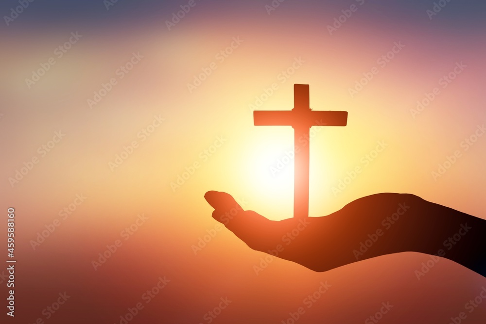 Man hands pray with a cross. Concept of hope, faith, christianity, religion, church online.
