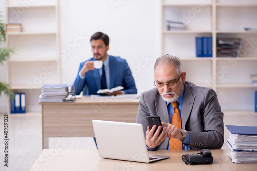 Two colleagues working in the office