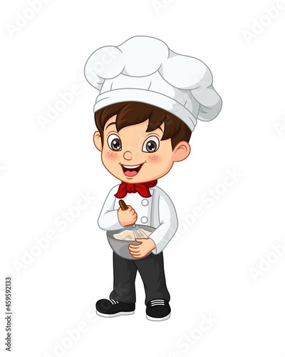Cute little boy chef cook mixing ingredients in bowl