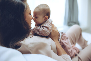 Woman with a baby. Beautiful mother with a baby. High quality photo