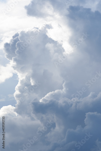 Blue sky background with cloud in summer season © Thodsaphol Tamklang