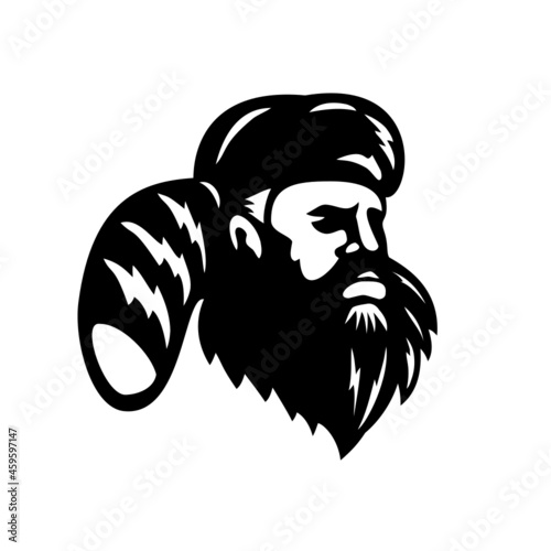 Mascot illustration of head of an American mountain man, frontiersman, explorer or trapper looking to side wearing furry felt hat on isolated white background in retro style. photo