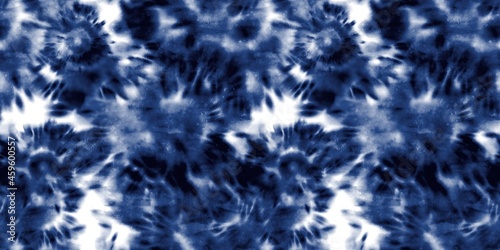 Seamless indigo tie dye 1970s funky hippie repeat pattern swatch motif for surface design and print. High quality illustration. Vibrant navy blue apparel material print. Psychedelic textile design.