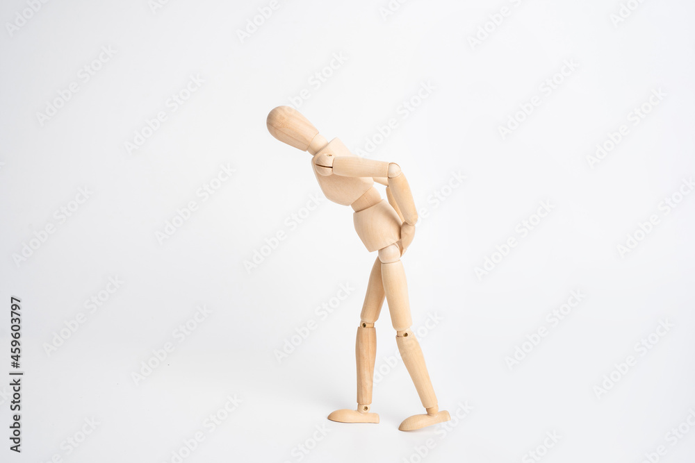 Wooden man problem with digestion on white background isolation. Digestive system problems Wooden man problem with digestion on white background isolation. Digestive system problems
