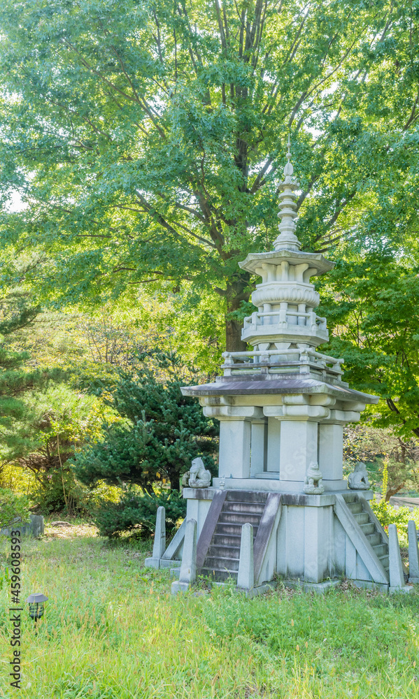 Pagoda under shade tree at Buddhist temple Pagoda under shade tree at Buddhist temple