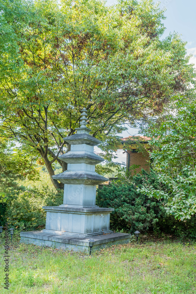 Pagoda under shade tree at Buddhist temple Pagoda under shade tree at Buddhist temple