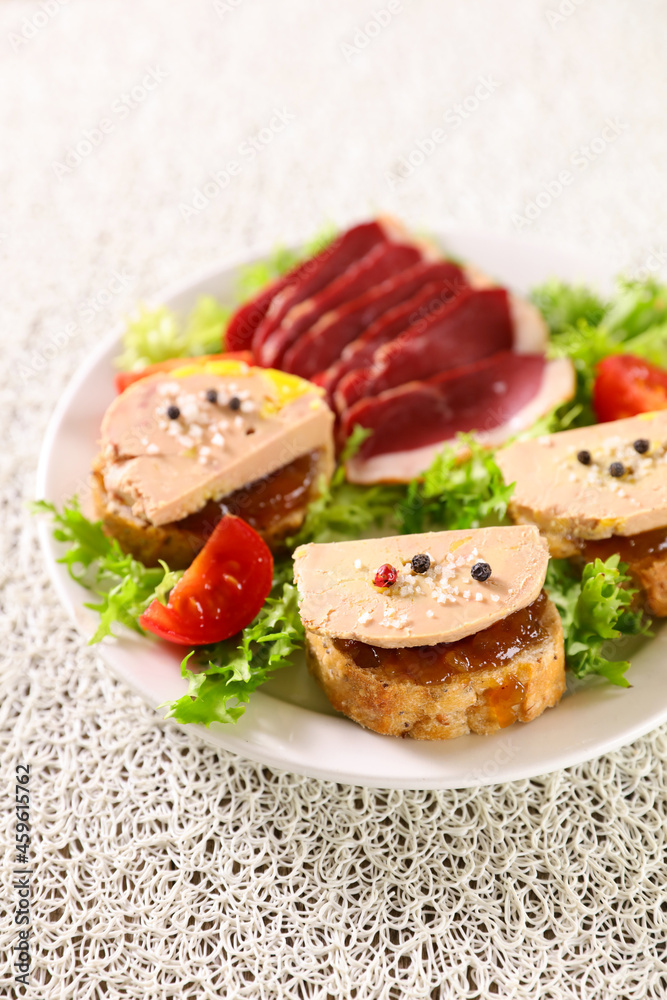 plate with toast of foie gras- french christmas cuisine