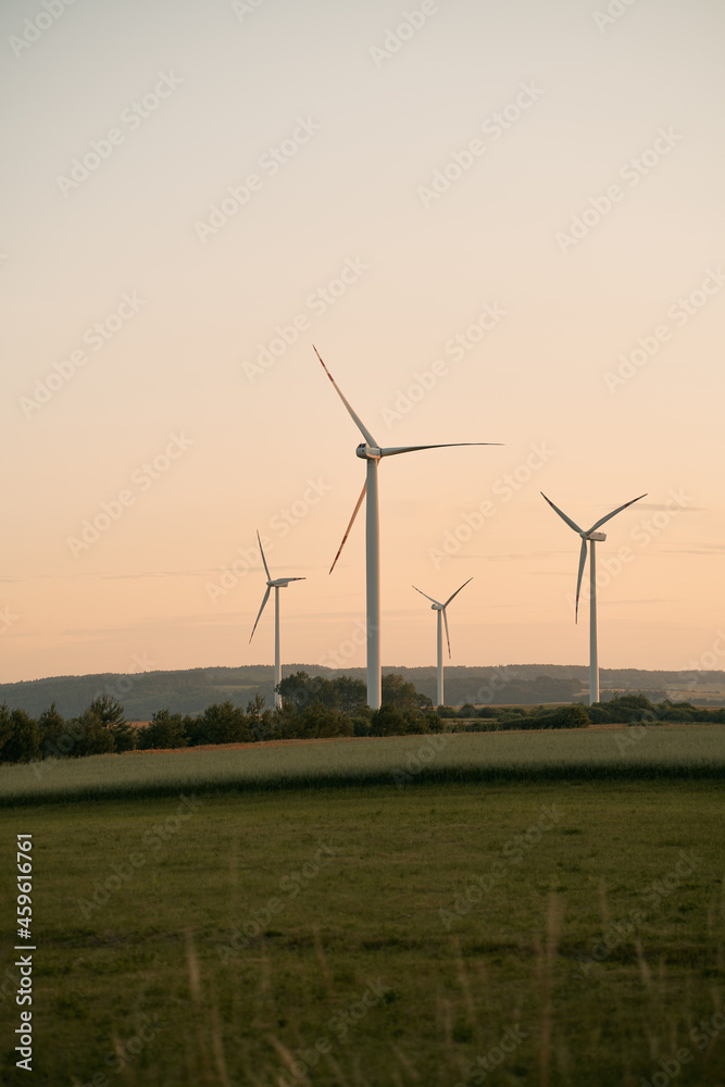 Wind turbine farm in the rural area in Poland. Renewable energy in the Europe