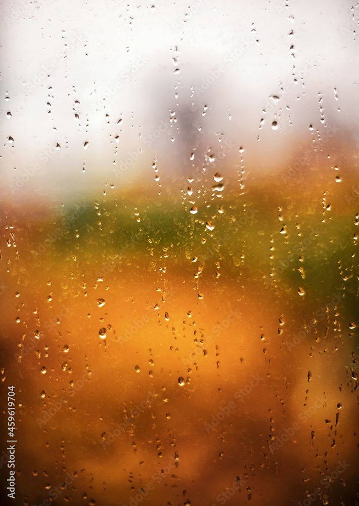Raindrops on the window. Autumn mood