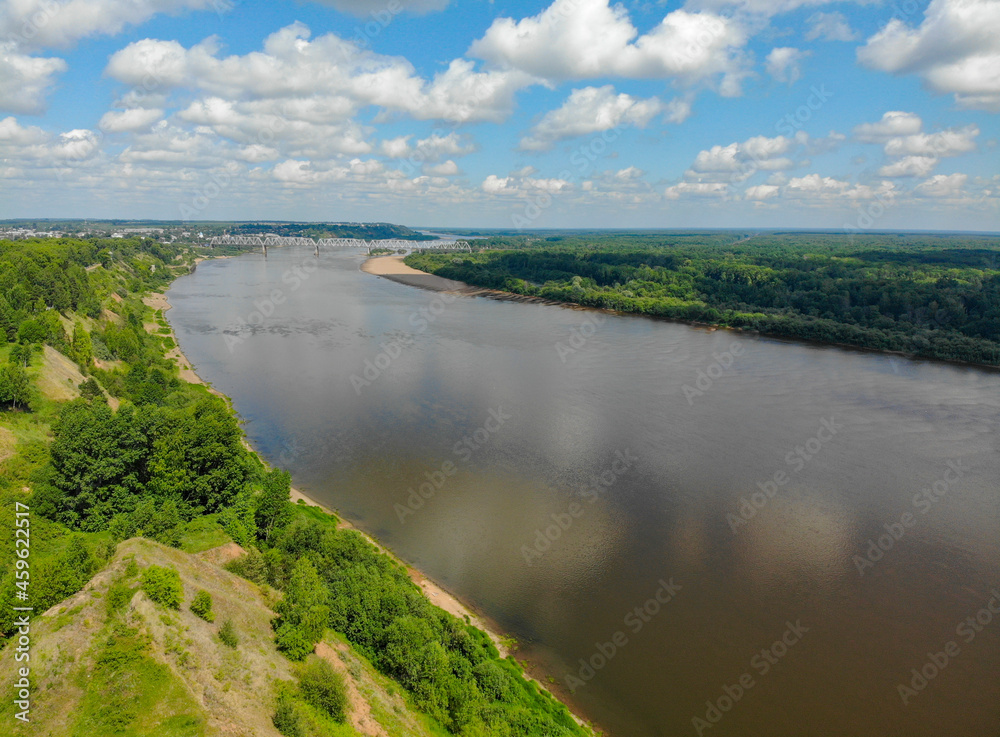 Aerial view of the Vyatka river and railway bridge (Kotelnich, Kirov region, Russia)