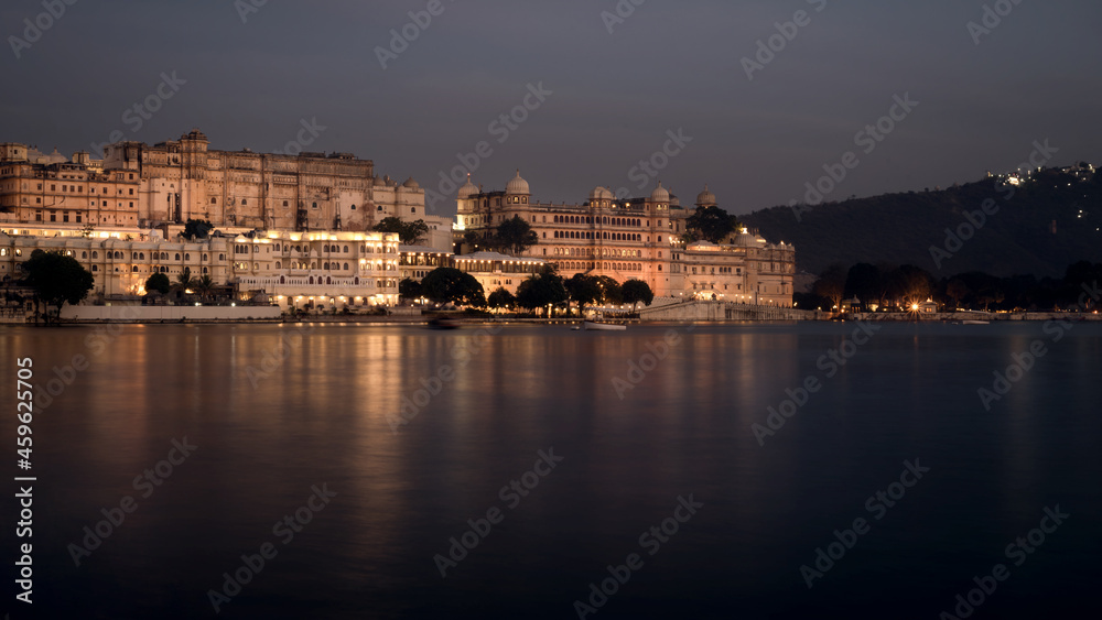 Long Exposure photograph of City Palace near lake Pichola during night