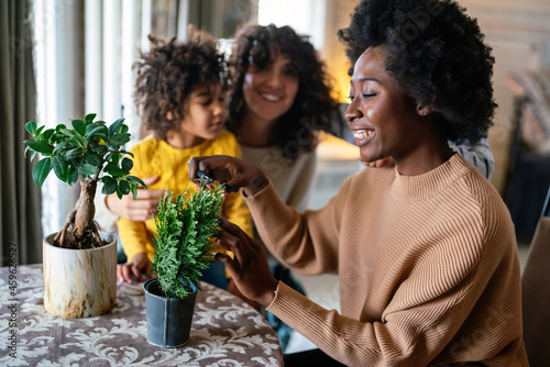 Home hobbies gardening with children and learning botany. Family love happiness concept