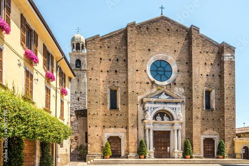 View at the Cathedral of Santa Maria Annunziata in the streets of Salo - Italy