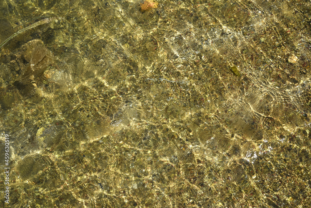ripples and glare on the water surface, top view ripples and glare on the water surface, top view