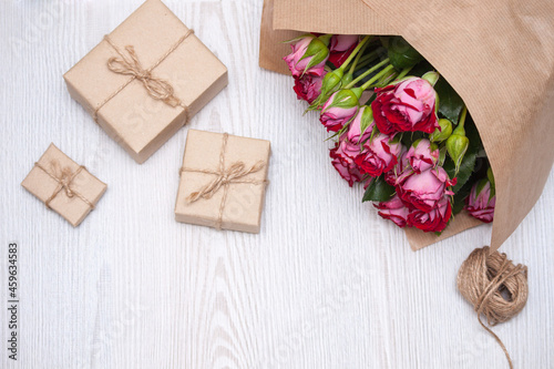Flowers, present boxes from eco friendly materials. Natural concept for holidays.